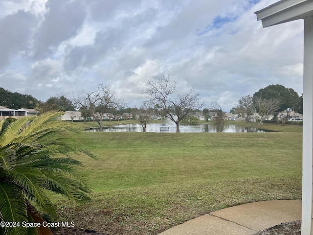 view of yard with a water view