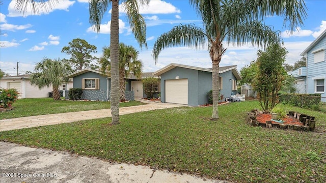 single story home featuring a front yard and a garage