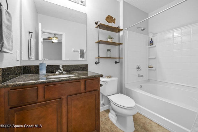 full bathroom with vanity, ceiling fan, washtub / shower combination, tile patterned flooring, and toilet