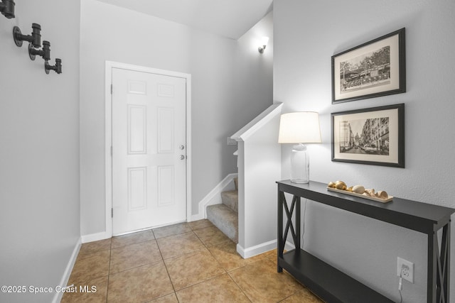 entryway featuring tile patterned flooring