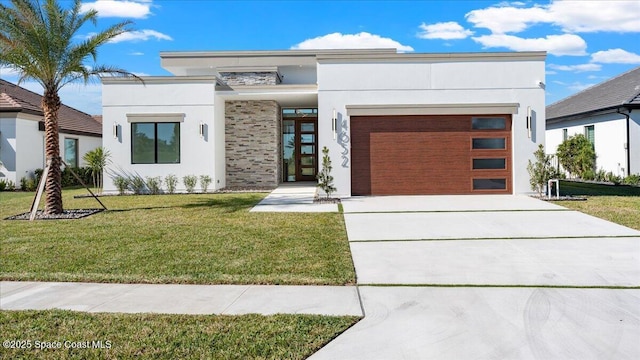 modern home with a garage and a front yard