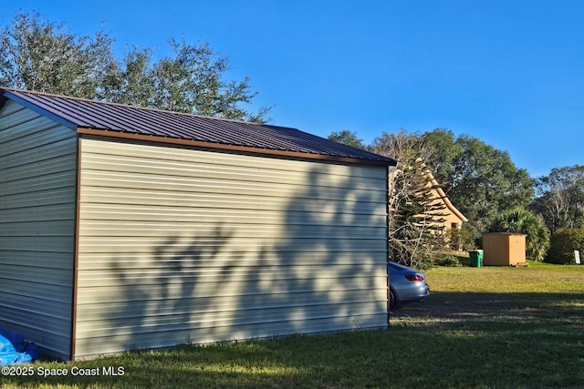 view of home's exterior with a yard