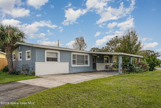 ranch-style home with a front yard