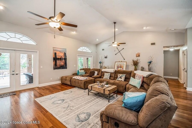 living room with ceiling fan, french doors, vaulted ceiling, and hardwood / wood-style flooring