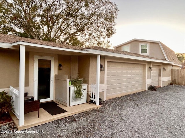 view of front of home featuring a garage