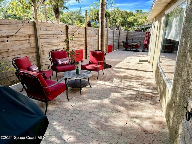 view of patio / terrace featuring a grill