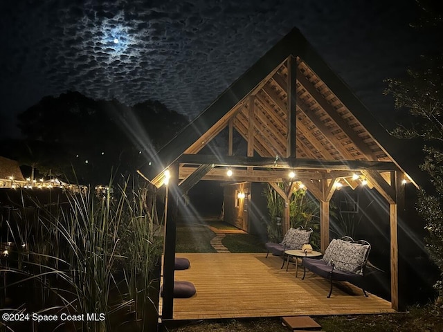 patio at twilight with a deck