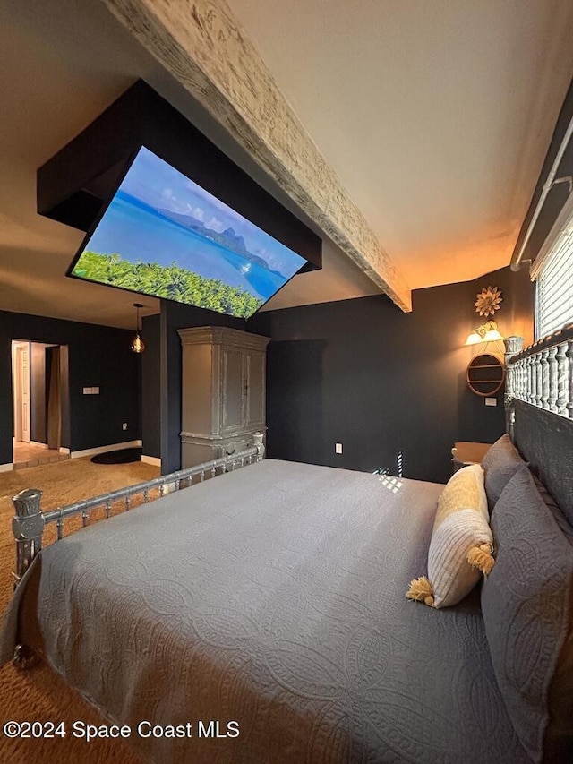 bedroom featuring beamed ceiling