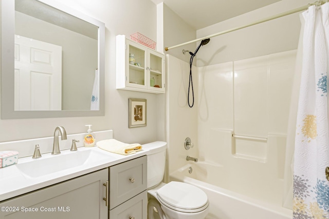 full bathroom with toilet, vanity, and shower / bathtub combination with curtain