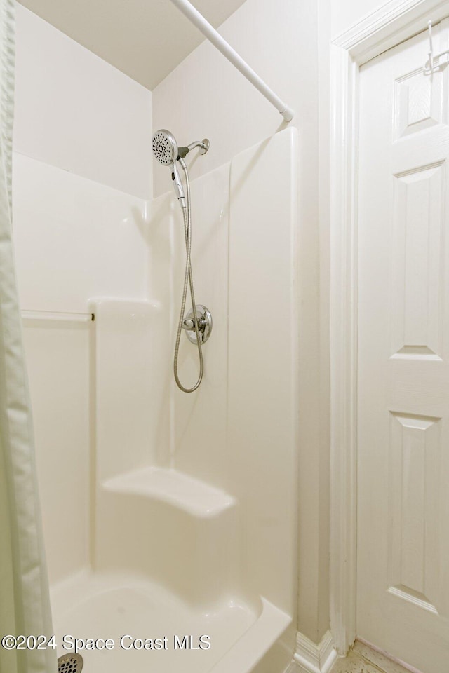 bathroom with walk in shower