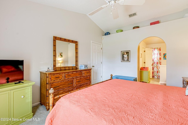 bedroom featuring ceiling fan, light carpet, and lofted ceiling