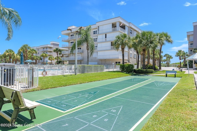 601 Shorewood Dr Unit 402, Cape Canaveral, FL 32920 - view of community with shuffleboard