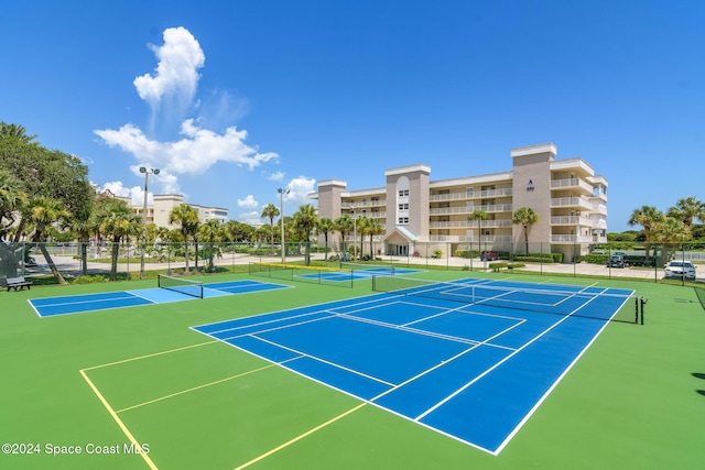 view of sport court featuring basketball hoop