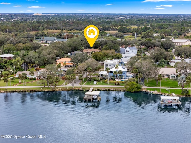 birds eye view of property featuring a water view