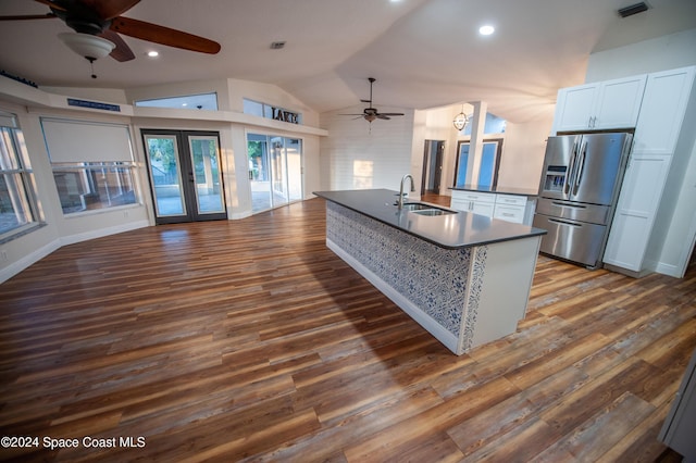 kitchen with stainless steel fridge, french doors, dark hardwood / wood-style flooring, sink, and white cabinetry