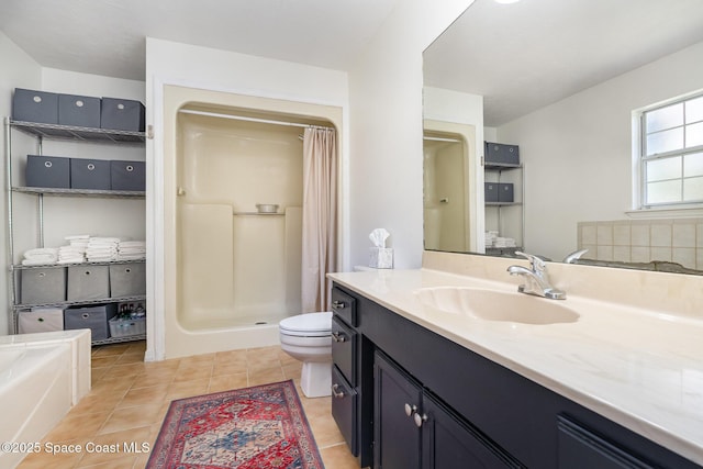 bathroom featuring tile patterned flooring, vanity, a shower with shower curtain, and toilet