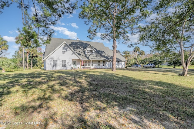 exterior space featuring a front yard