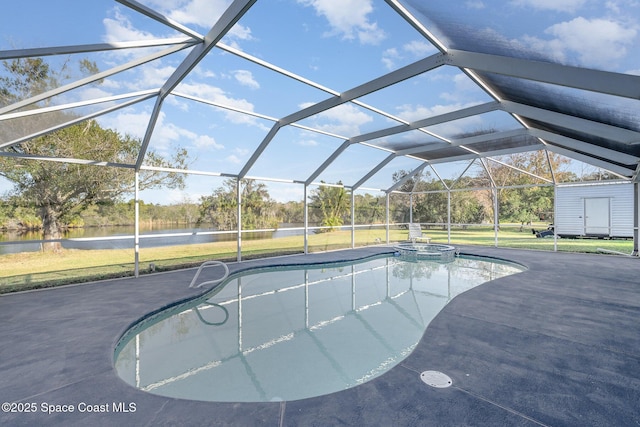 view of pool with a lanai, a lawn, a water view, and a patio