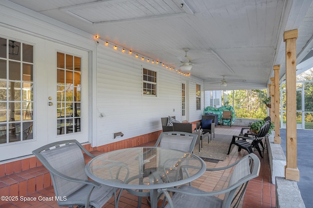 view of patio featuring outdoor lounge area, ceiling fan, and french doors