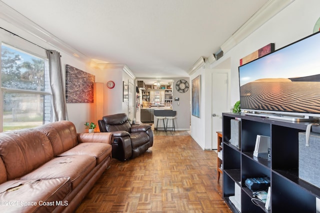 living room featuring parquet flooring and crown molding