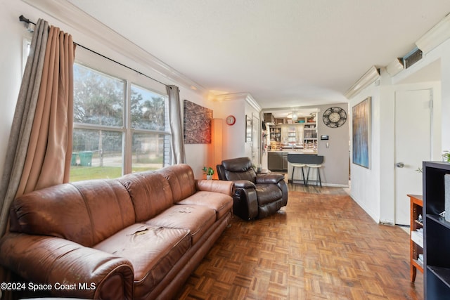 living room with parquet floors and ornamental molding