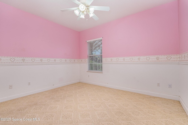 unfurnished room featuring ceiling fan