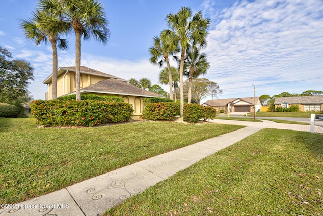 exterior space with a front yard