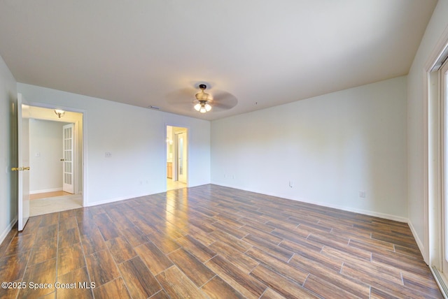 unfurnished room with ceiling fan