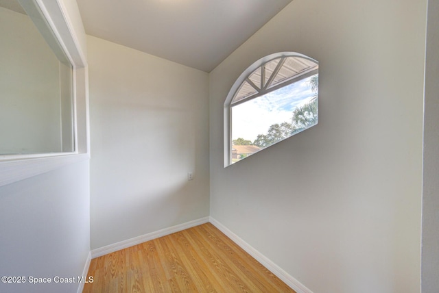 unfurnished room with light hardwood / wood-style floors