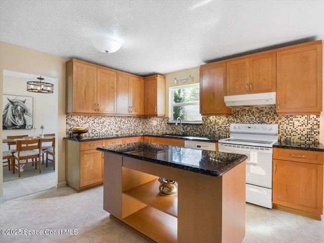 kitchen featuring sink, white electric range, dark stone counters, a textured ceiling, and a kitchen island