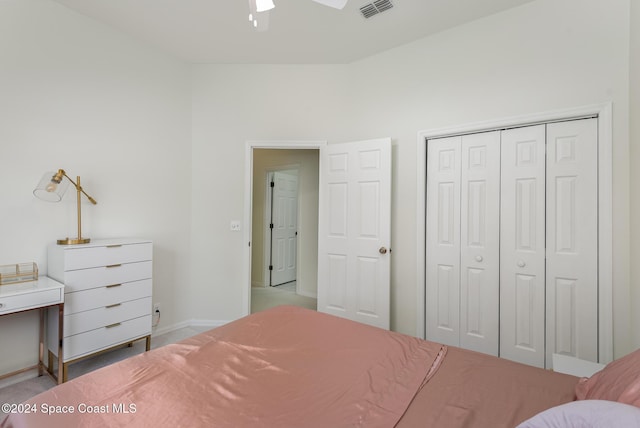 bedroom featuring ceiling fan and a closet