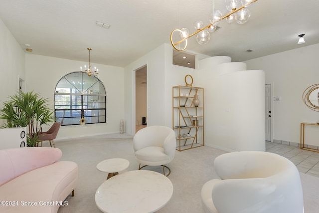 living room featuring a notable chandelier