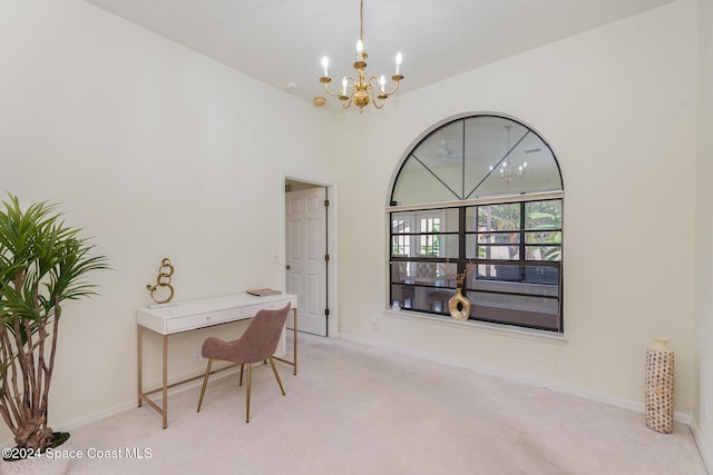 carpeted office space featuring a notable chandelier