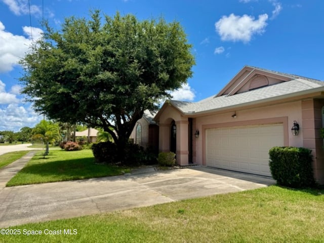 4740 Seminole Trl, Merritt Island, FL 32953 - single story home featuring concrete driveway, a garage, a front lawn, and stucco siding