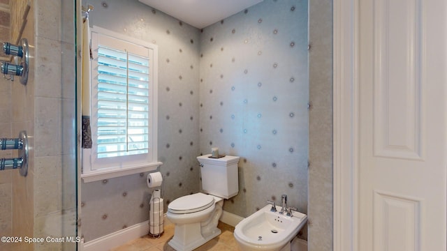 bathroom featuring tile patterned flooring, toilet, walk in shower, and a bidet