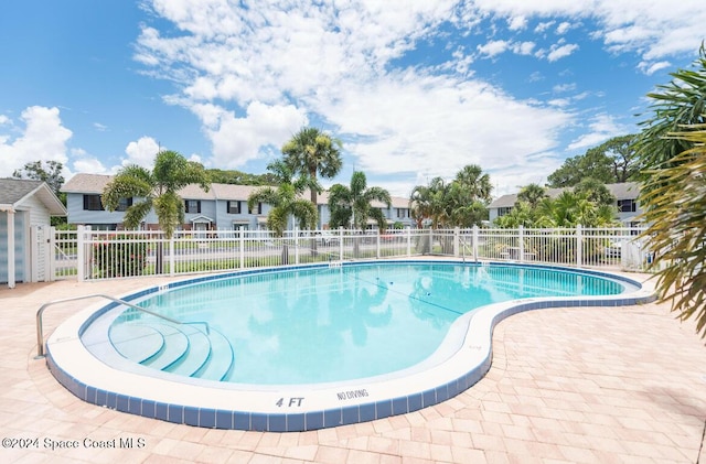 view of pool with a patio area