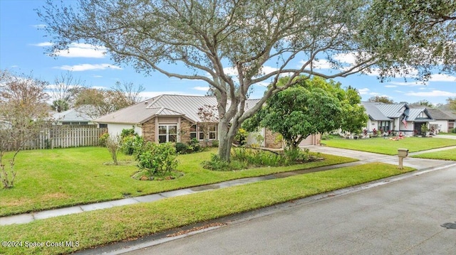 view of front of home with a front lawn