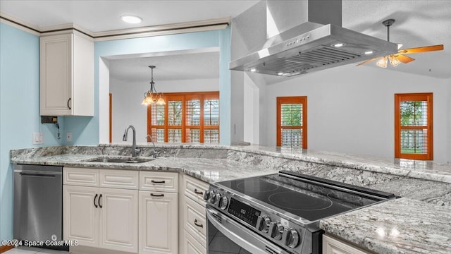 kitchen featuring lofted ceiling, sink, range hood, appliances with stainless steel finishes, and white cabinetry