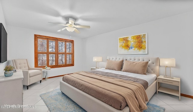 bedroom featuring ceiling fan and light tile patterned flooring