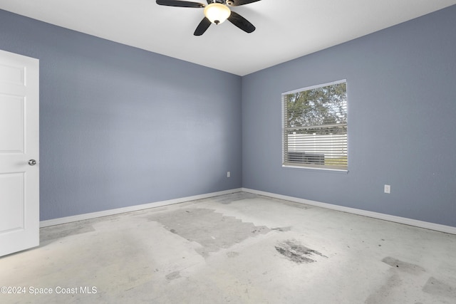 spare room with ceiling fan