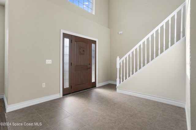 entrance foyer with tile patterned flooring