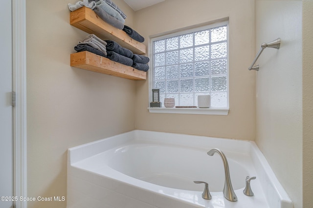 full bathroom featuring a garden tub