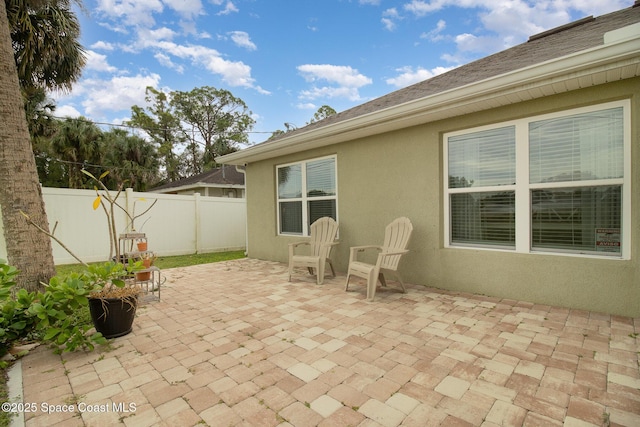 view of patio with fence