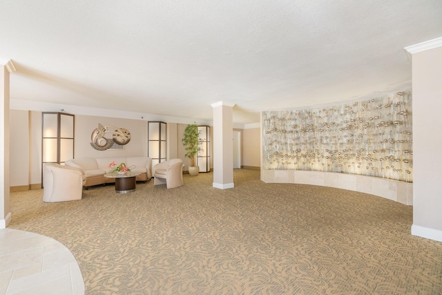 unfurnished living room featuring carpet and crown molding