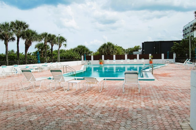 view of pool featuring a patio area