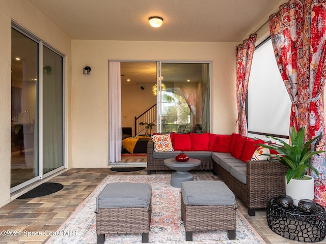 8933 Amelia Downs Trl, Kissimmee, FL 34747 - view of patio / terrace featuring an outdoor hangout area