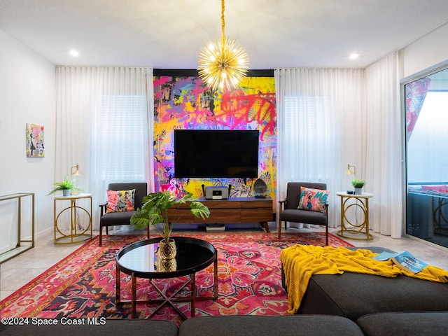 living room featuring tile patterned flooring and an inviting chandelier