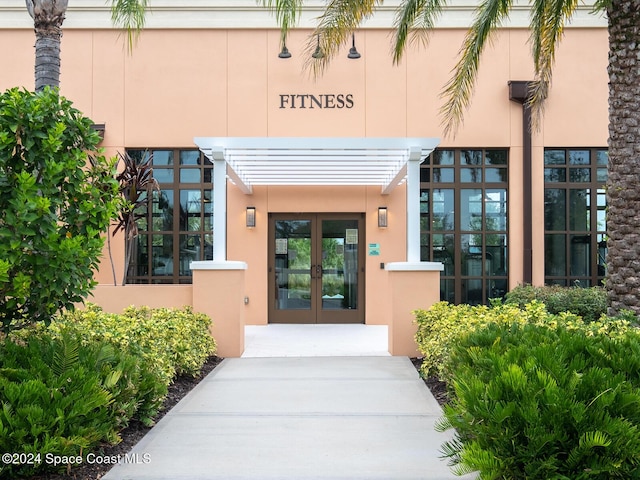 entrance to property featuring french doors