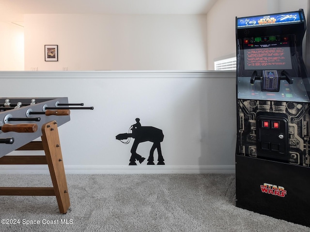 exercise room featuring carpet