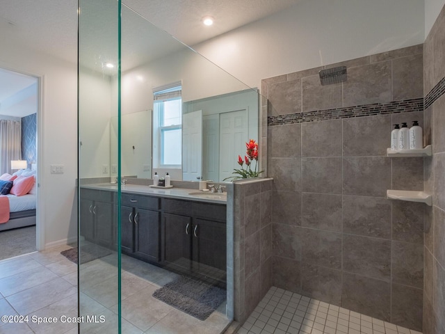 8933 Amelia Downs Trl, Kissimmee, FL 34747 - full bath featuring double vanity, a walk in shower, tile patterned flooring, and ensuite bathroom